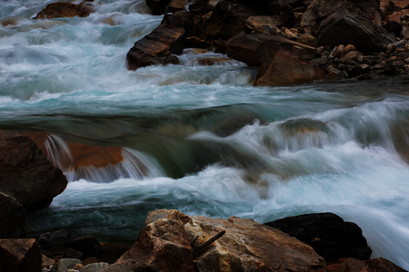 Stream of flowing waterの写真素材