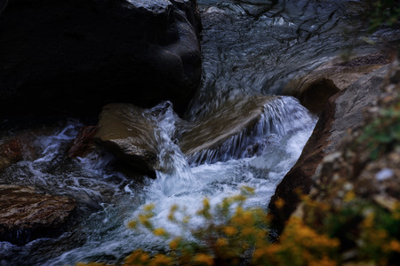 Stream of flowing waterの写真素材