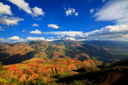 View of the red land of Kunming during sunsetの写真素材
