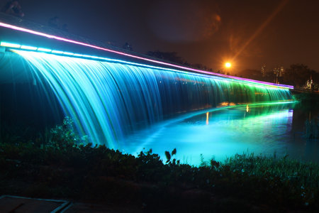 Ho Chi Minh, Vietnam - May 20, 2018: Anh Sao or Starlight Bridge is a pedestrian bridge with a waterfall and beautiful coloured lighting. It is a major tourist attraction in district 7 of Ho Chi Minhのeditorial素材