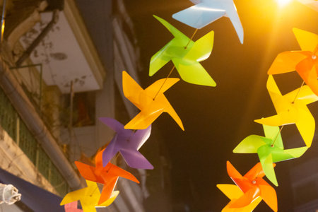 Colorful pinwheels hang on Luong Nhu Hoc street on mid-autumn night, Ho Chi Minhの写真素材