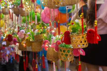Bamboo lantern with stuffed rabbit and flashing lights in Vietnamの写真素材