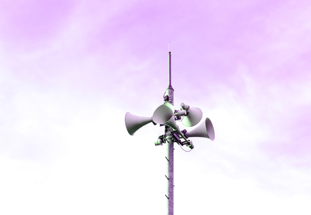 Loudspeaker to be used for the announcement of the event of a disaster.loudspeaker of disaster-forecast with pink, purple sky.の写真素材