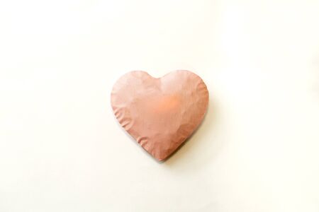 a big pink heart and white background and copy space.の写真素材