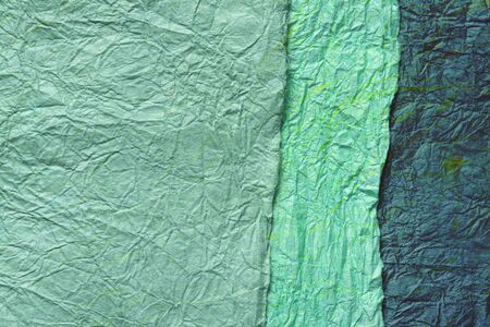 japanese abstract paper texture.3 colors of blue green and dark green. close up.