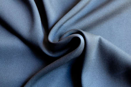 Background texture of black pattern fabric made of cotton or silk close up.の写真素材