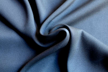 Background texture of black pattern fabric made of cotton or silk close up.の写真素材