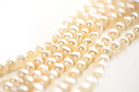 Beads from pearls, on a white background and copy space. close up.の写真素材