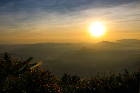 Morning sky with sunrise on the mountainsの写真素材