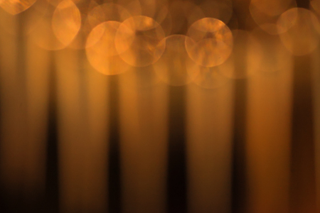 Abstract circular bokeh with wide orange stripes backgroundの写真素材