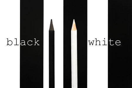 Black and white penciles standing out from crowd on b/w stripe background. business success concept of leadership an uniqueness,independence, initiative,strategy, dissent, think differentの写真素材