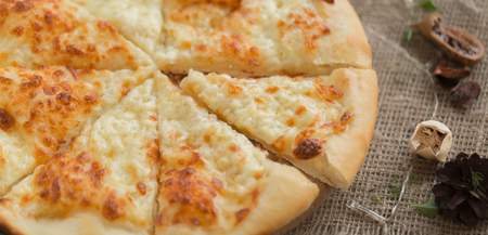 Khachapuri - traditional Georgian bread. Homemade baking. Georgian cuisine food concept. Rustic color styling.の写真素材