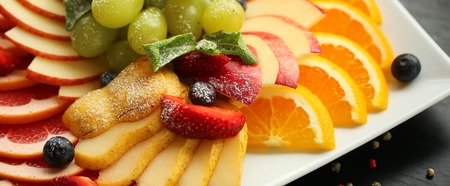 Healthy food. Close up food image of assorted fruits. Macro photography. 16 in 9 crop for design of banner.の写真素材