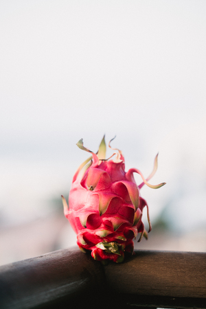 Close up food image of dragon fruit. Travel inspiration photo with a small depth of field. Blur background with copyspace for design.の写真素材