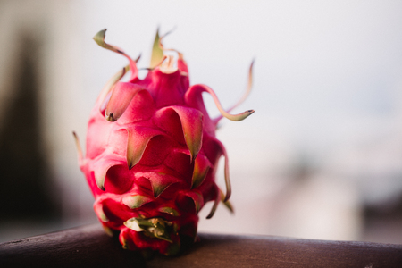 Close up food image of dragon fruit. Travel inspiration photo with a small depth of field. Blur background with copyspace for design.の写真素材