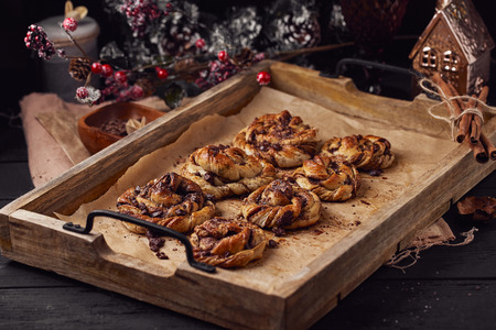cinnabon with chocolate. Cake food concept photo. Close up view.の写真素材