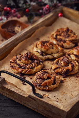 cinnabon with chocolate. Cake food concept photo. Close up view.の写真素材