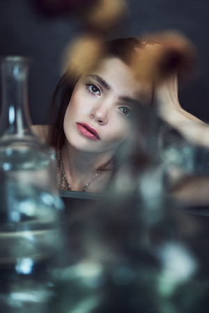 Beauty portrait of girl with water and reflections. Hight quality retouching photo. Fashion model.の写真素材