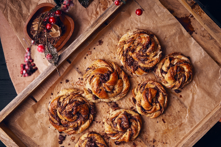Buns with chocolate and cinnamon as cake food concept. Top view.の写真素材