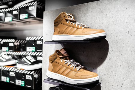 Nurmberg, GERMANY - February 27, 2019: The ADIDAS man sneakers on the shell in the shop. Fashionable foot wear shoes. Close up photo sport concept.のeditorial素材