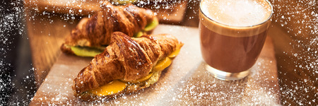 Web Banner 3 in 1 crop for design. Fresh croissant and original authors coffee with fruits on wooden table. Healthy breakfast food concept. Traditional french lunch in cafe with gold sunlight flare.の写真素材
