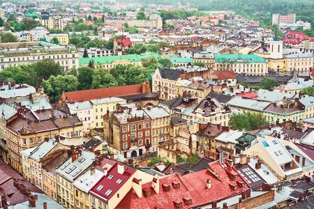 Lviv, Ukraine - May 20, 2019: View of the old Lviv. Bright color roofs of houses in historical city center.のeditorial素材