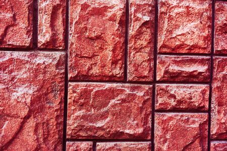 Background brick texture. Hard old painted wall in grunge style. Surface for design and text. Close...