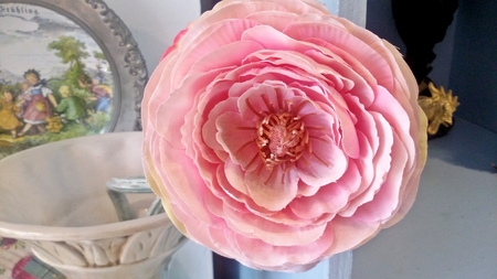 A pink artificial flowerの写真素材
