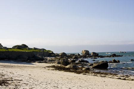 rocks on a beach in brittanyの写真素材