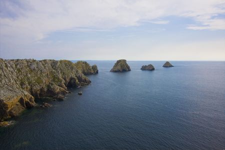 rocks on a beach in brittanyの写真素材