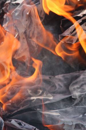 some papers burns in a big fireの写真素材