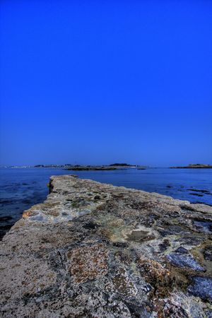 rocks on a beach in brittanyの写真素材