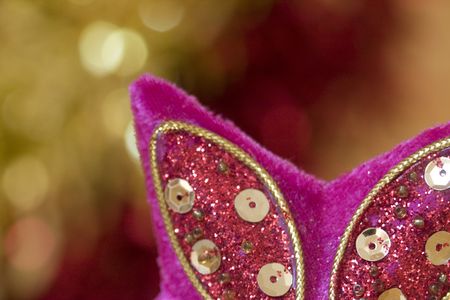 macro of a christmas ball in front of blur backgroundの写真素材