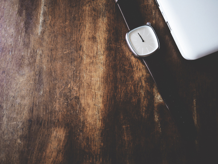 Watch on the wooden tableの写真素材