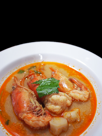this is Tom Yum Kung on  black isolatedの写真素材