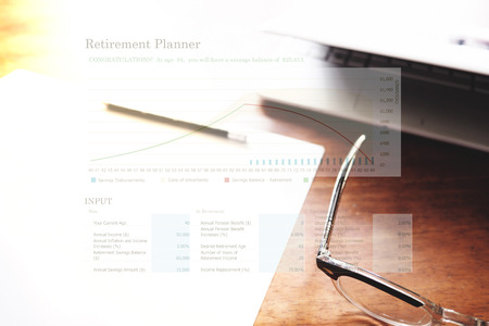 Retirement planning graph on workplace background. Retirement planning concept.の写真素材