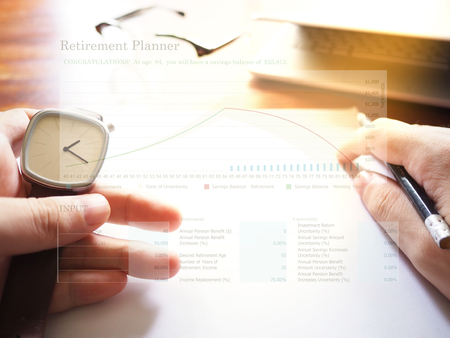 Retirement planning graph on workplace background. Retirement planning concept.の写真素材