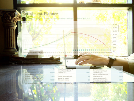 Retirement planning graph on workplace background. Retirement planning concept.の写真素材