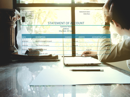 The picture of statement account form on workspace background. Financial management conceptの写真素材