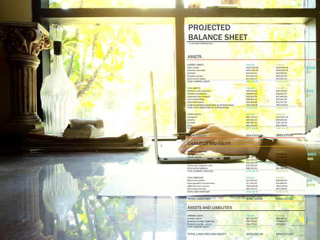 The picture of projected balance sheet on workspace background. financial management conceptの写真素材