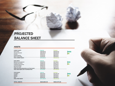 The picture of projected balance sheet on workspace background. financial management conceptの写真素材