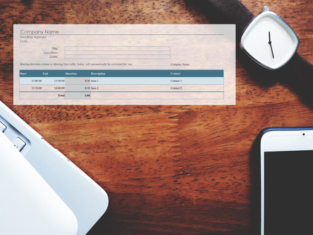 The picture of meeting agenda form on workspace background. Financial management conceptの写真素材
