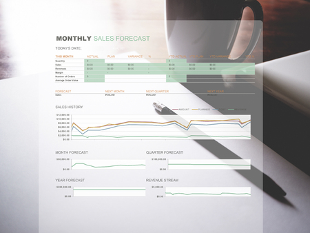 Monthly sales forecast graph on workplace background. Monthly sales forecast concept.の写真素材
