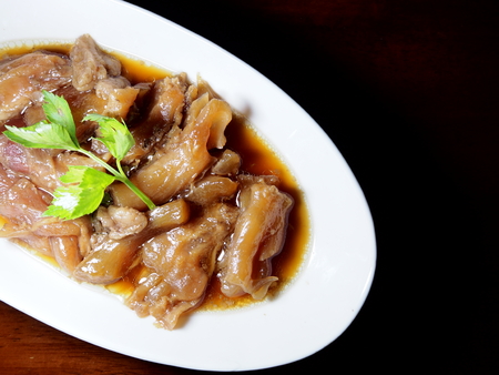 Top view picture of Chinese style beef tendon stew on white dish.の写真素材