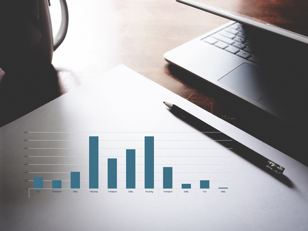 personal expenses graph on workspace background. Financial management conceptの写真素材