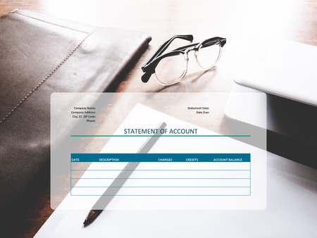 The picture of statement account form on workspace background. Financial management conceptの写真素材