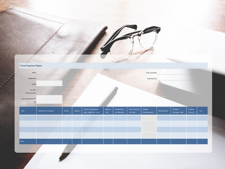 The picture of travel expense form on workspace background. financial management conceptの写真素材
