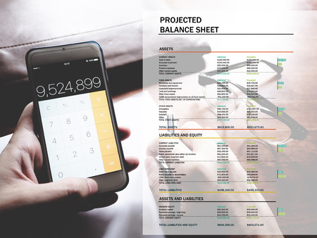 The picture of projected balance sheet on workspace background. financial management conceptの写真素材