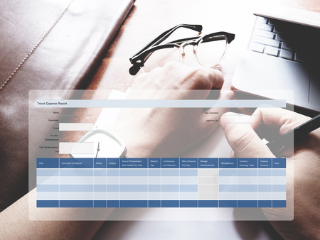 The picture of travel expense form on workspace background. financial management conceptの写真素材