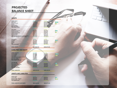 The picture of projected balance sheet on workspace background. financial management conceptの写真素材